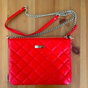 Red Kate Spade shoulder bag with gold hardware